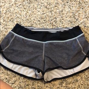 Gray lululemon speed shorts w/ blue & pink detail